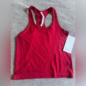 Brand new Lululemon tank with tags. Size M (size 8).